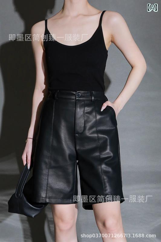格好いい ショート タイプの ストレート パンツの 爆発 的な 羊の 皮の 柔らかい半 ズボンは やせて います。