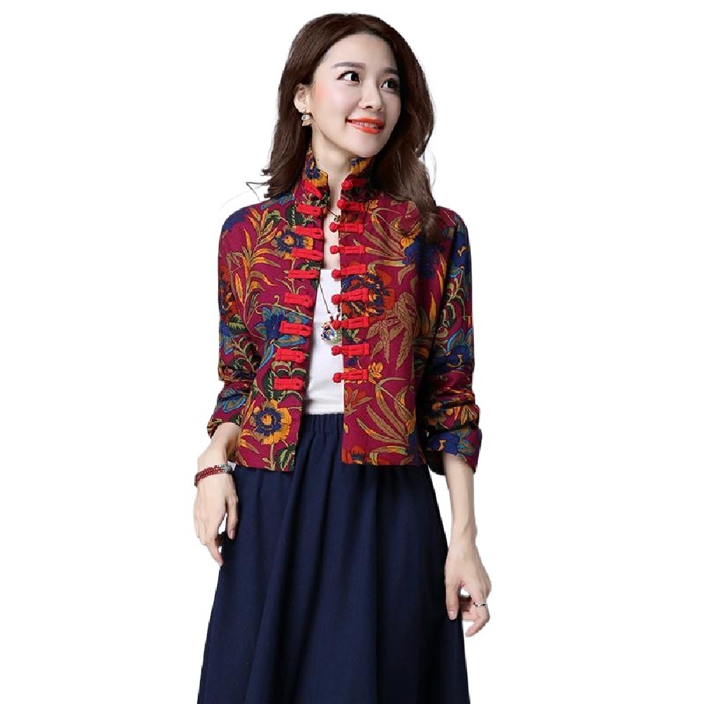 中国の新年と春の女性の綿麻のレトロな皿は唐の服の上着を掛けます。