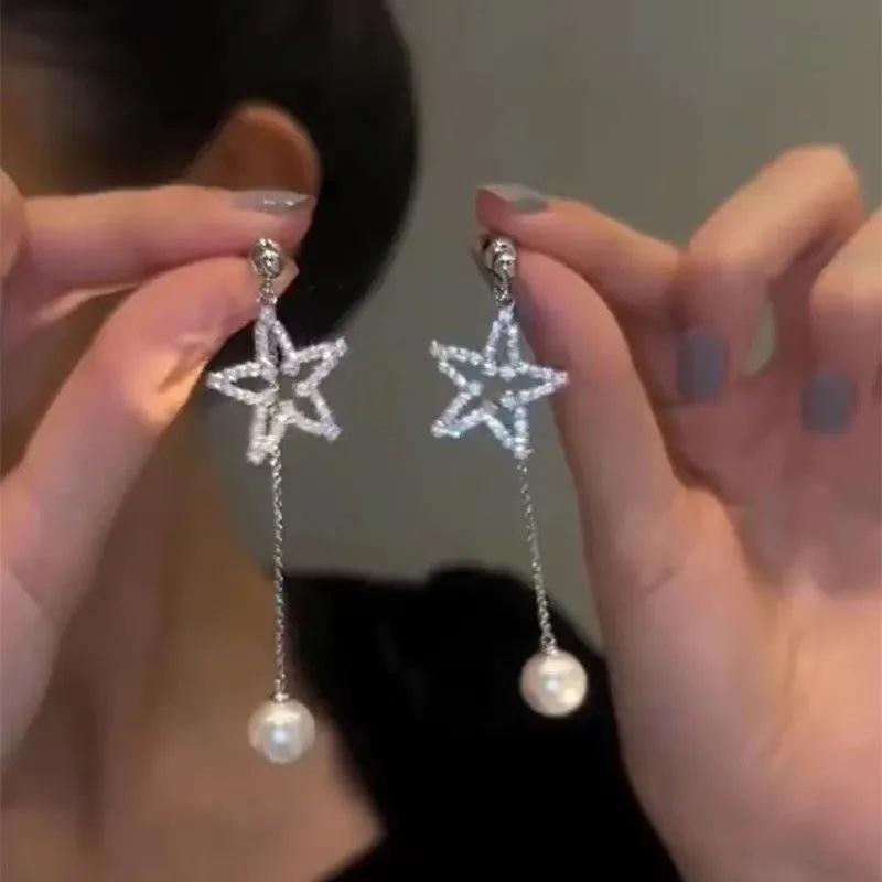 イヤリング パール 星モチーフ ロング フリンジ デザイン 高級感 洗練 コーディネートしやすい アクセサリー 女性用 デイリー 使い 気品 スタイル｜新風堂