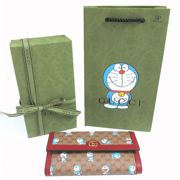 新品 Gucci Doraemon Gucci ドラえもん グッチ コレクション プリント Ggウォレット ロング フラップ 長財布 21年限定コラボ どらえもん 水色 スペシャル ショッパー ラッピング Mergertraininginstitute Com