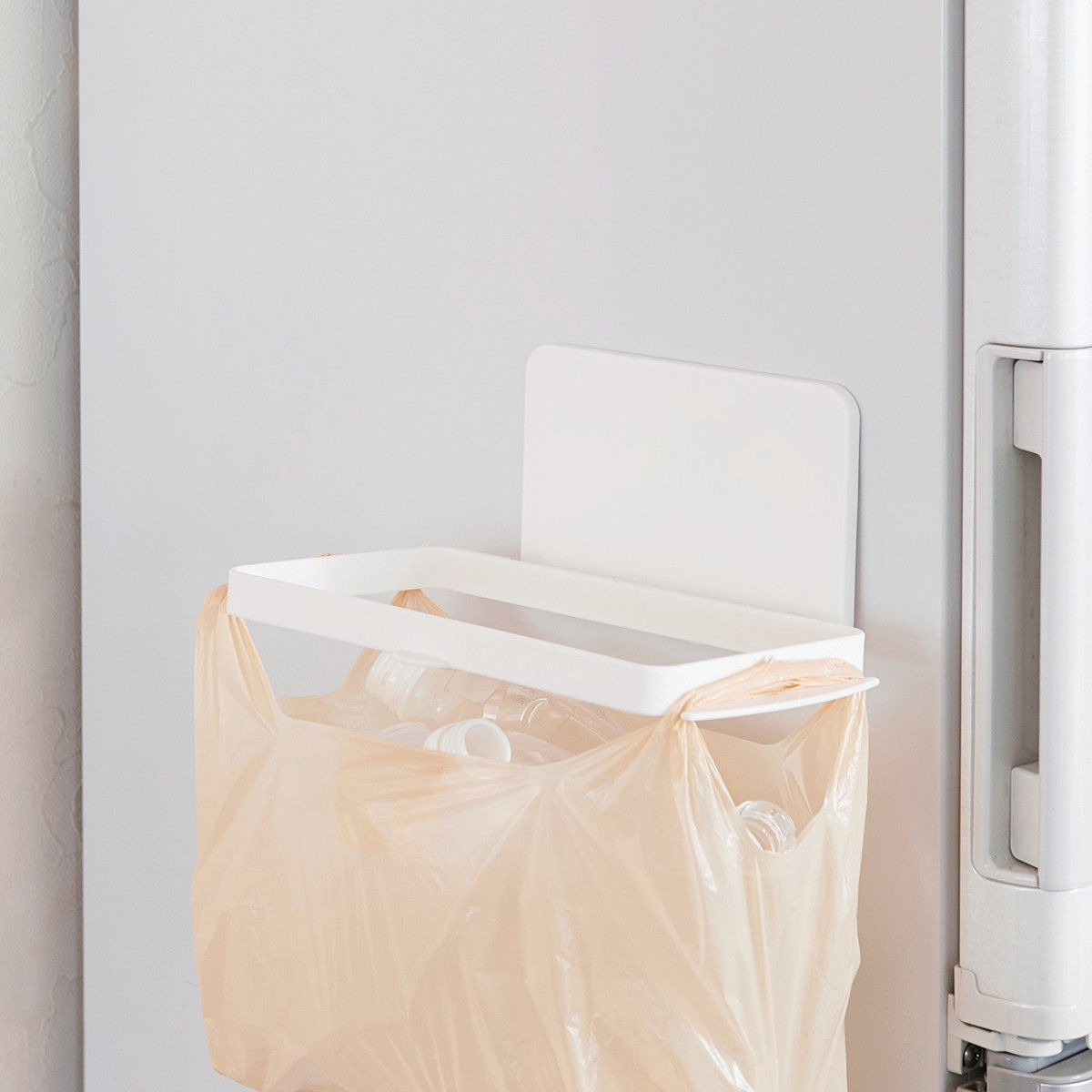 Trash Bag Holder Garbage Magnet With Er Mag On Recycle Recycling Bin Refrigerator Next To The Storage Dust