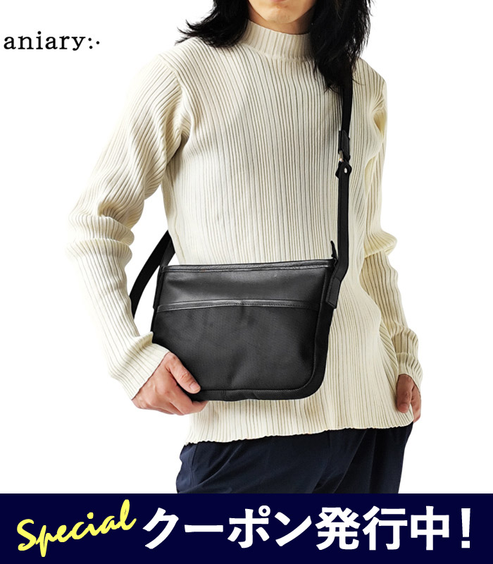 【★百貨店SALE押さえる引き換え証書き著す中！】アニアリ aniary ショルダーバッグ Shoulder メンズ レディース コーデュラツイル なめし革 Nylon Leather 曲がったがけ 肩肉 御徒面子 ナイロン 本革 うつり変わり オール時期 黒 黒いこと 70-03001 【2026SS-MEN】