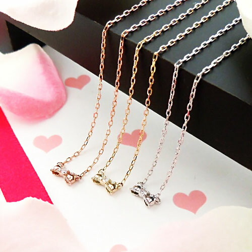 楽天市場】K18WG リボンモチーフ ダイヤモンドペンダント 【0.2ct