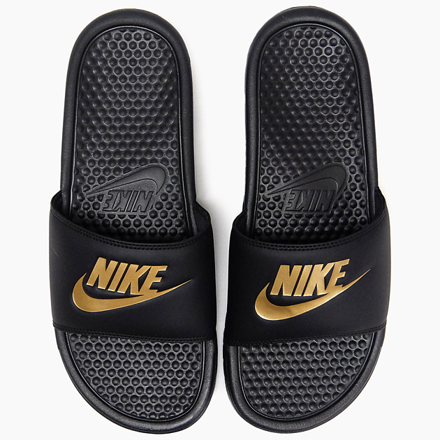 black and gold nike slippers