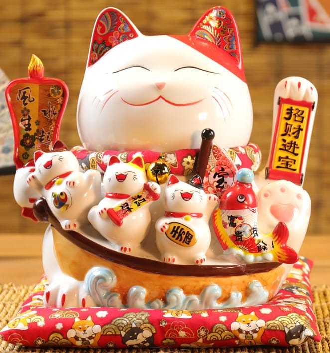 開店祝賀会 開業祝賀会 電動 招き猫 まねき猫 白磁製 瀬戸もの製 大型 割り増し金 青写真 座蒲団付 蓄電池 墨付き お手々お手伝いさん かわいく 手招き します 自動小銃で 腕を振ります ラッキーアイテム 暮らし向き向