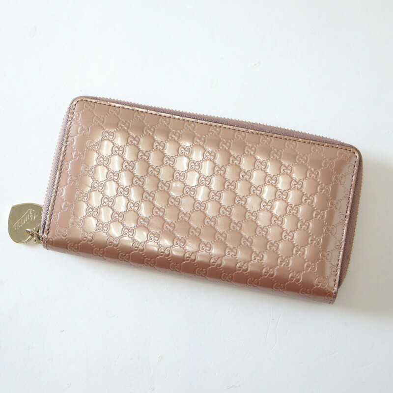 【中古】GUCCI グッチ ラウンドチャック札入れ マイクログッチシマ 専売特許なめし革 メタリックピンク×ゴールド金具 308260
