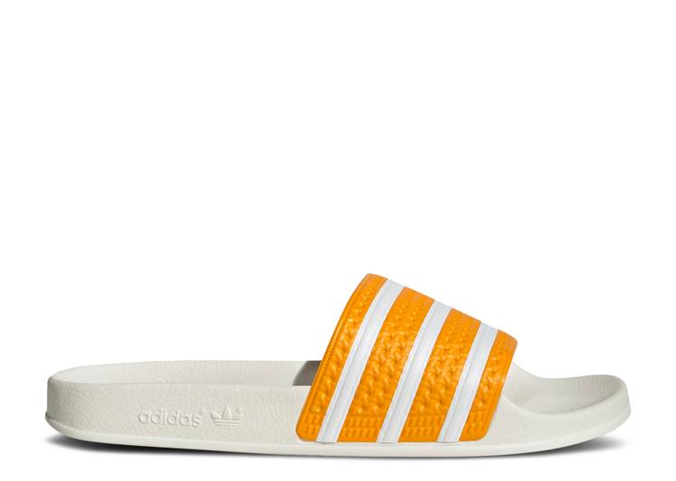 【 ADIDAS ADILETTE SLIDE TEAM COLLEGE GOLD / TEAM COLLEGE GOLD CLOUD WHITE 】 アディダス アディレッタ サンダル カレッジ チーム ゴールド 白色 ホワイト スニーカー メンズ