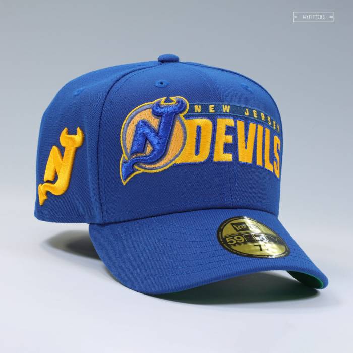 ニューエラ New Era 【 New Jersey Devils Nhl Blockbuster Inspired Fitted Cap Unisex Serene Slate / Rich Gold / Sapphire Metallic / Moonbeam 】 ジャージ デビルス キャップ 帽子 ユニセックス ゴールド｜スニケス