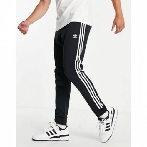 アディダス Adidas Originals アディダス オリジナルス 棒縞 スキニー ジョガーパンツ 墨染め ブラック メンズ Stripe Adidas Originals Adicolor Three Skinny Joggers In Black Bairien Yamagata Jp