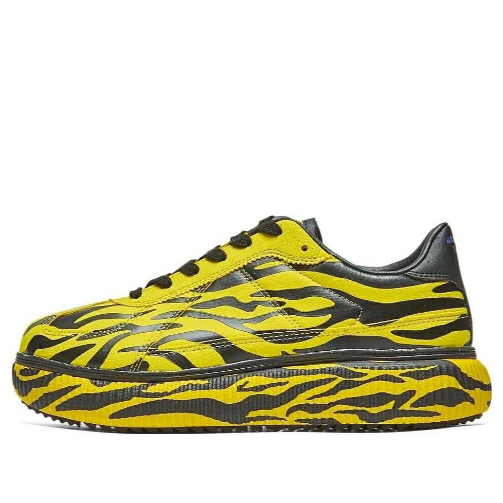 黄色 イエロー 黒色 ブラック オニツカタイガー 'TIGER' スニーカー メンズ ONITSUKA TIGER ONITSUKA TIGER X URUSEI YATSURA DELECITY 1183C073-750 / YELLOW BLACK