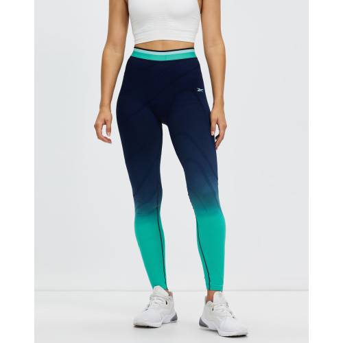 リーボック パフォーマンス ユナイテッド フィットネス ハイ ライズ レギンス タイツ 紺色 ネイビー レディース 【 REEBOK PERFORMANCE UNITED BY FITNESS SEAMLESS HIGH RISE LEGGINGS VECTOR NAVY FUTURE TEAL