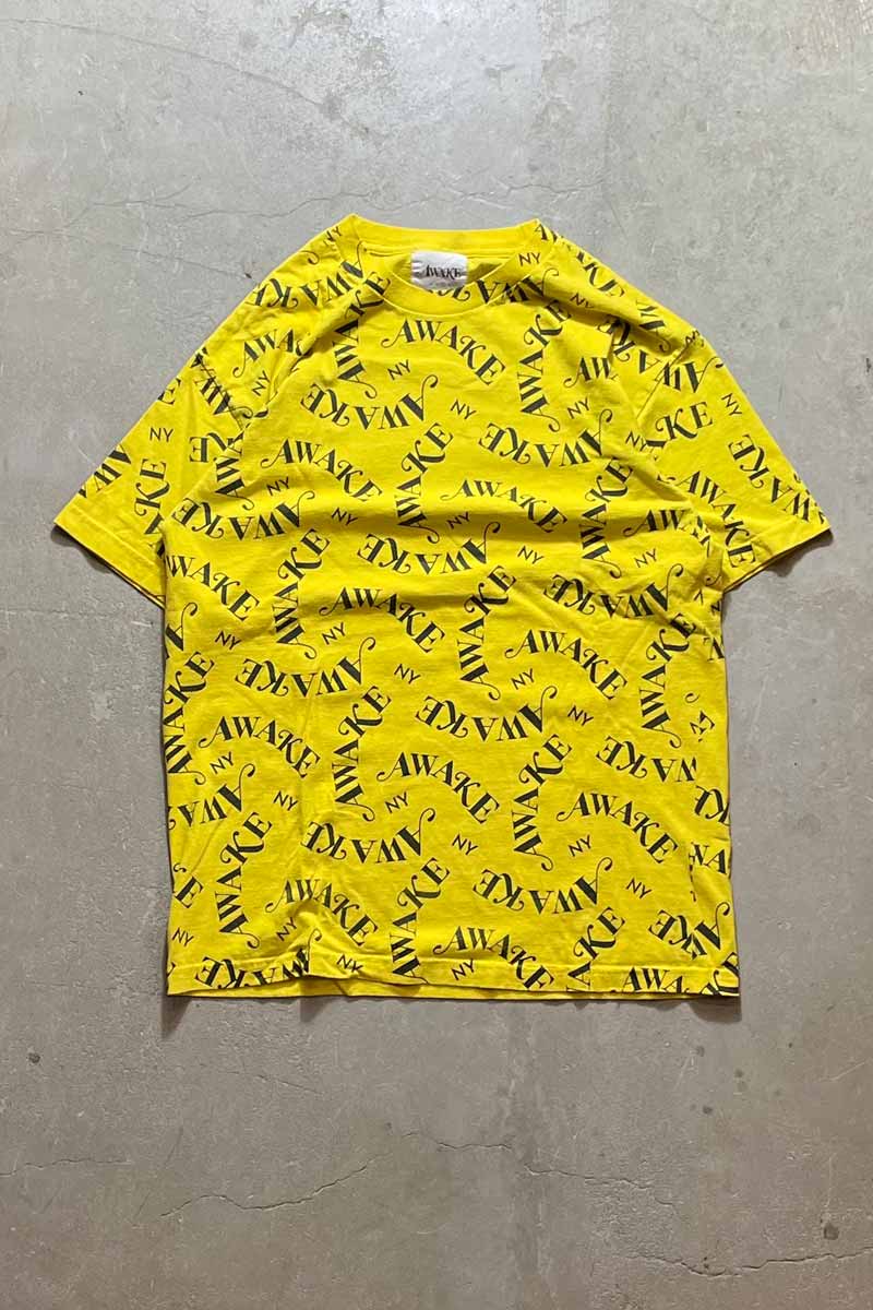 【中古】AWAKE (アウェイク) MADE IN USA ALL OVER PRINT LOGO T-SHIRT USA製 オール オーバー プリント ロゴ Tシャツ YELLOW [SIZE: L USED]