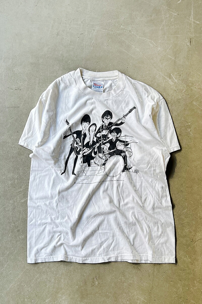 【中古】HANES (ヘインズ) MADE IN USA 90'S AL HIRSCHFELD DRAWING THE BEATLES ART&BAND T-SHIRT アメリカ製 90年代 アル ハーシュ フェルド ドローイング ザ ビートルズ アート アンド バンド Tシャツ WHITE [SIZE: M USED]｜JULIUS NYC 25,669円