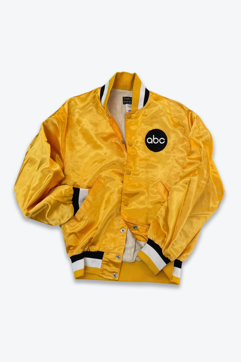 【中古】SAFA-GEE（サファ・ジー） MADE IN USA 70'S ABC TV CHANNEL NYLON SATIN STADIUM JACKET 70年代 アメリカ製 ナイロンレギュラーフィットジャケット YELLOW [SIZE: S USED]｜JULIUS NYC