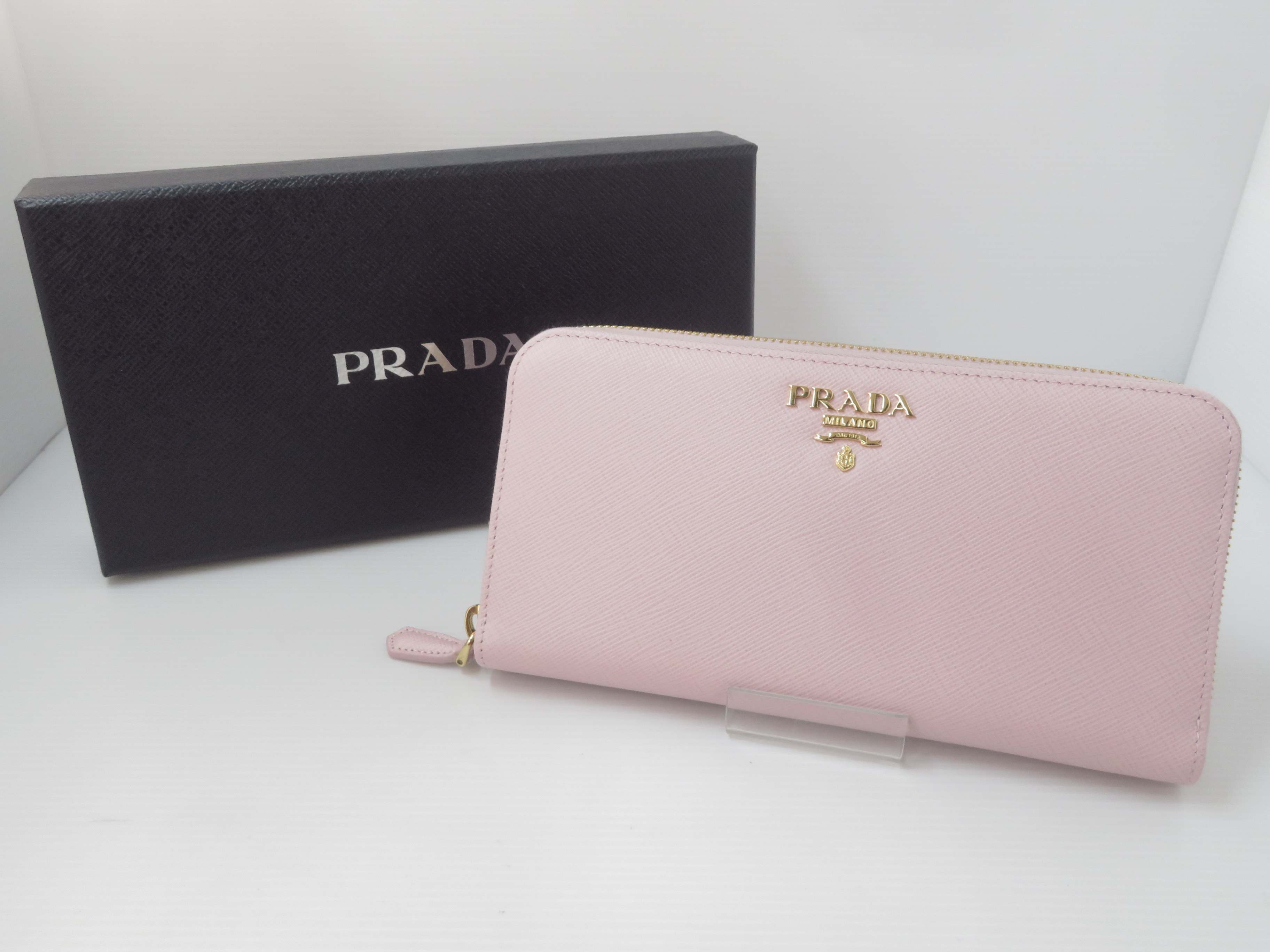 【中古】  PRADA プラダ 金属元素ロゴタイプ サフィアーノ レザーラウンドファスナー長紙入れ 1ML506  【鳥取店】