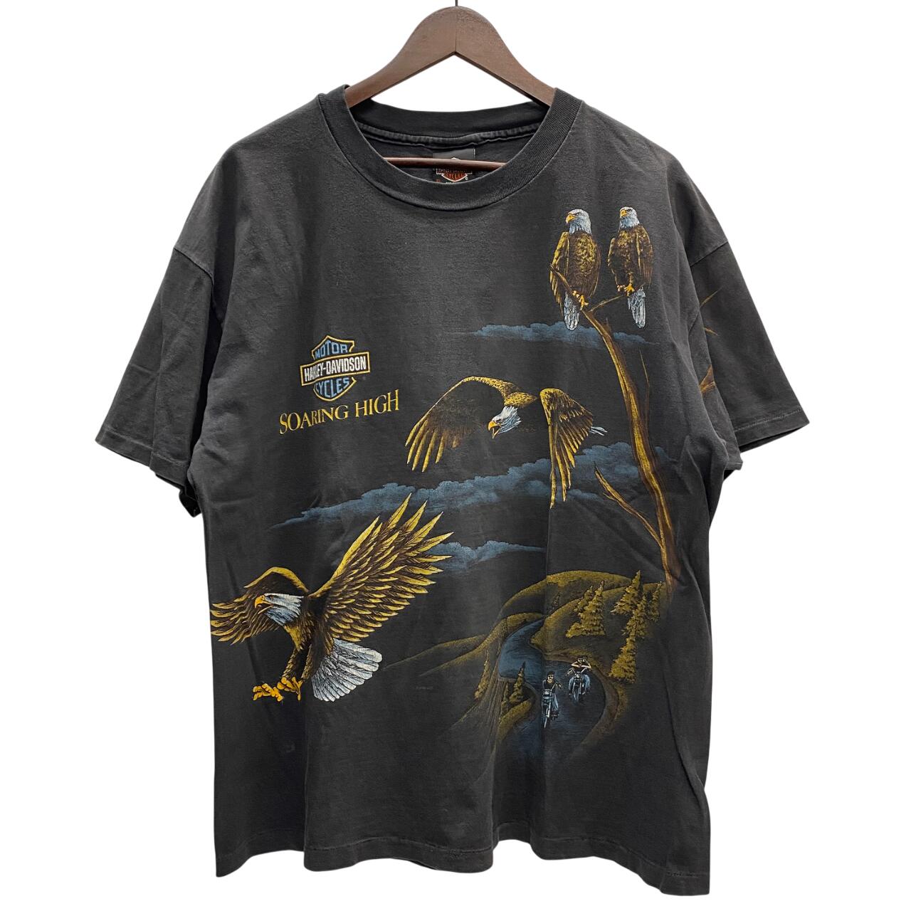 【中古】ハーレーダビットソン HARLEY-DAVIDSON 90\u0027s USA製 Soaring High AOP Graphic 鷲 フェイド プルオーバー 黒いこと XL大きさ 201MT-5544 VB