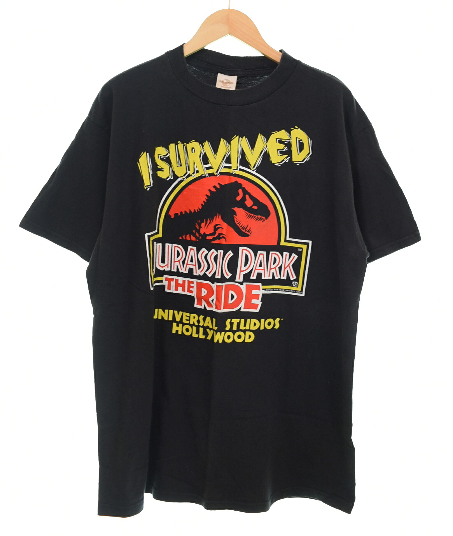 【中古】US古着 90s Made in USA Jurassic Park The Ride Holly Wood ジュラシック パーク ハリウッド I Survived Tee 90's 90年代 XL Tシャツ ブラック LLサイズ 103MT-4370｜ドンドンサガール