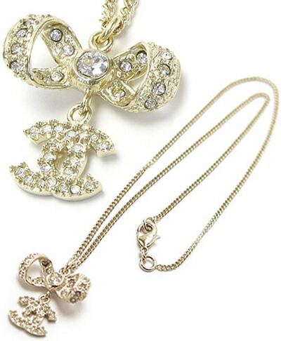 CHANEL シャネルペンダントネックレスリボン＆ドロップココマークシャンパンゴールド ラインストーンドロップパール ボウタイPENDANT NECKLACECCマーク アクセサリー｜kaminorth
