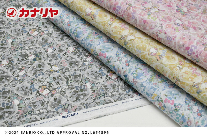 【新品】LIBERTYリバティ×ハローキティ　プリントブラウス　ブルー　サイズM LIBERTY. リバティプリント 国産 タナローン バブル・ドリームス