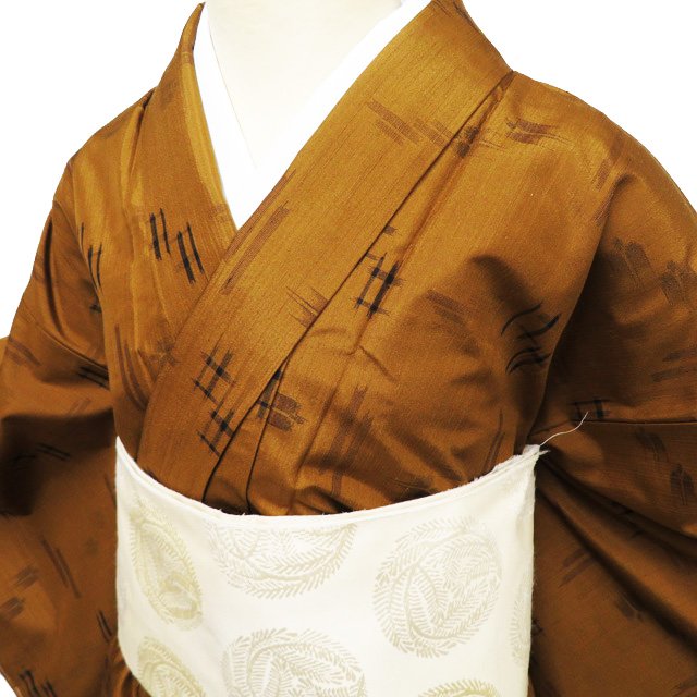 【 中古 】 紬地 リサイクル着物 正絹 袷 カジュアル 絣模様 土色 身丈154.5cm 裄65cm S A1117-4 [和服 きもの 紬 普段着 kimono アウトレット 送料無料 きもの北條]