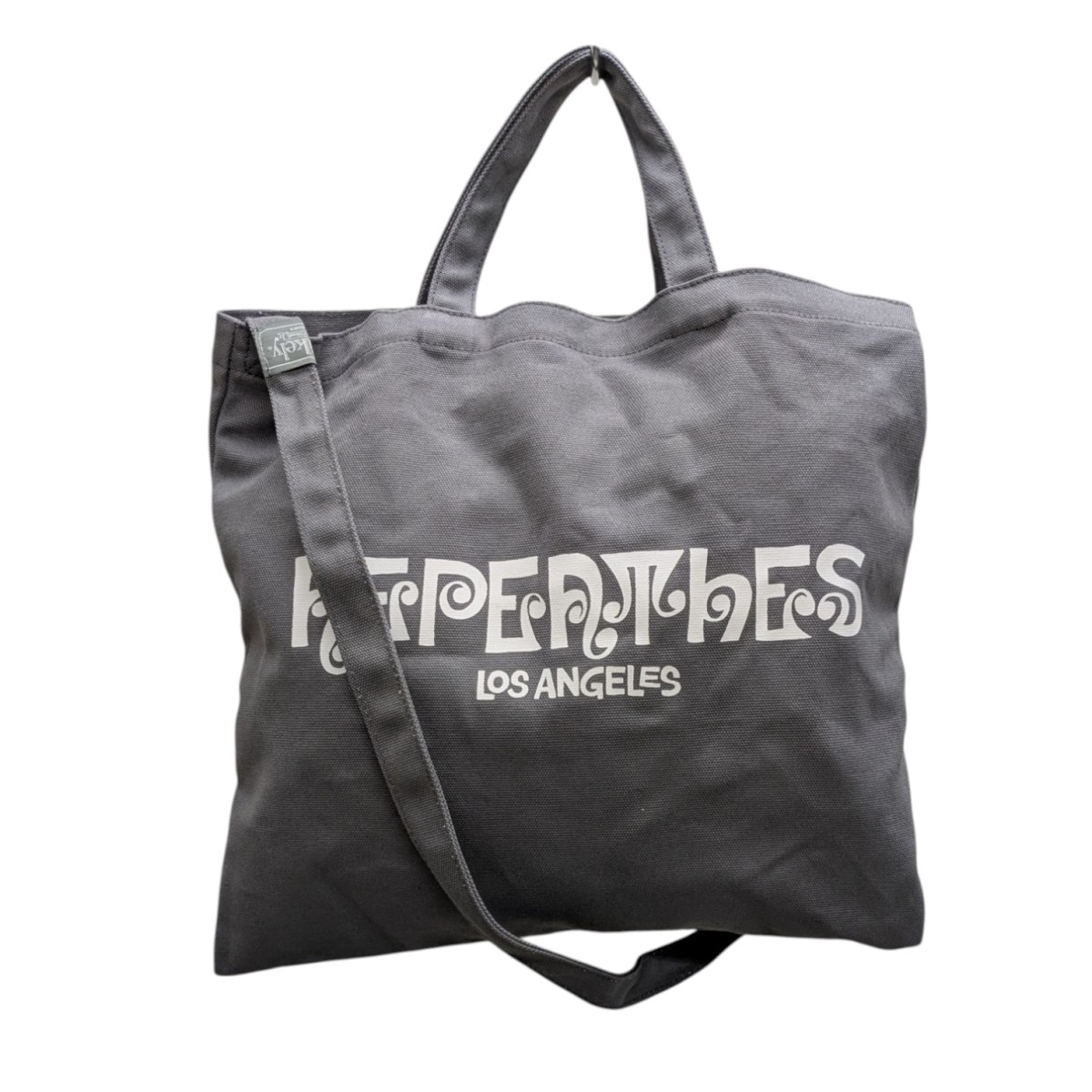 新品 希少モデル Unlikely x NEPENTHES トートバッグ 2日間限定販売。ネペンテス×アンライクリー×花井祐介のトリプル