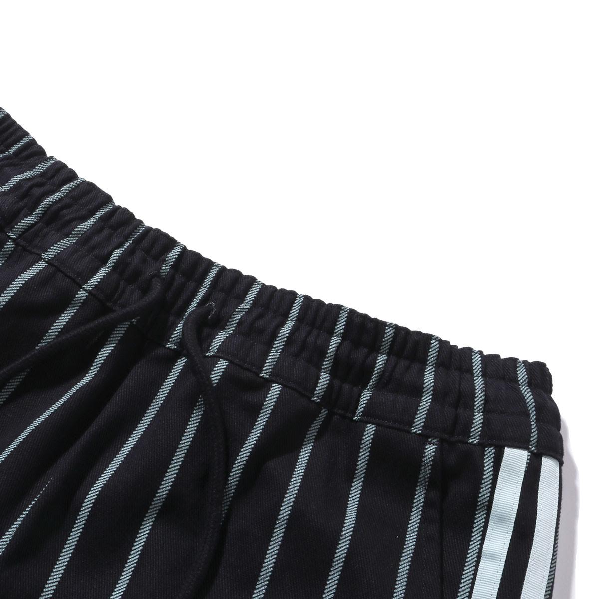 green and black track pants