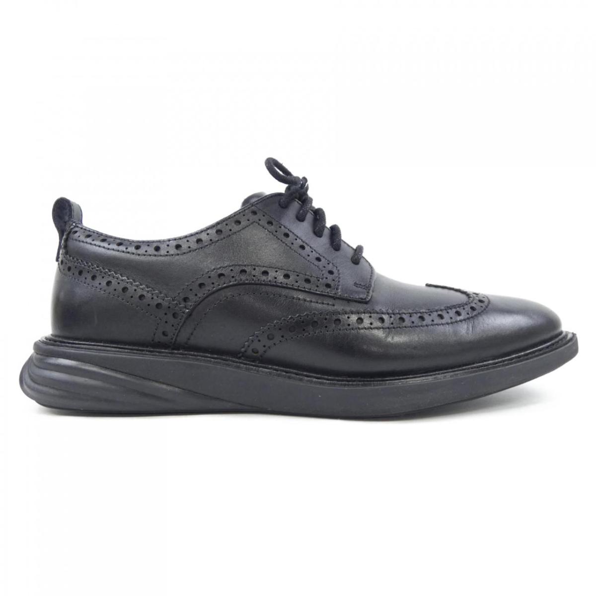 電話を掛けるハーン COLE HAAN スニーカー【中古】