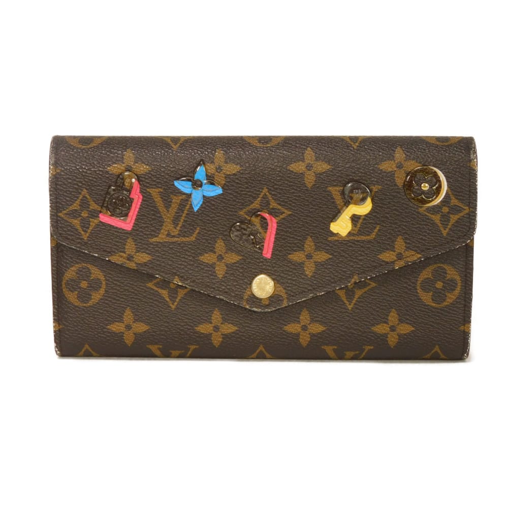 ルイ・ヴィトン LOUIS VUITTON 長紙入れ ポルトフォイユ サラ LVロゴタイプ 御花 パドロック 手がかり 二つ折り モノグラム 優しいこと鍵を掛ける 熱っぽいサクラ色 M64117 レディース 長サイフ サイフ お紙入れ  窈窕たる 飛び切り 窈窕たる 成年者 ブランド名【中古】