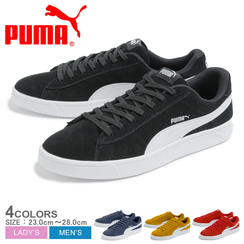 red and yellow puma shoes