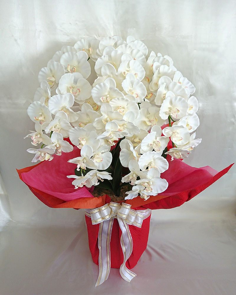 開店開業祝い 移転祝 新築祝などに アーティフィシャルフラワー 造花 胡蝶蘭鉢植え ５本立 ｗ ｙ プラ鉢に色紙ラッピング 光触媒コーティング