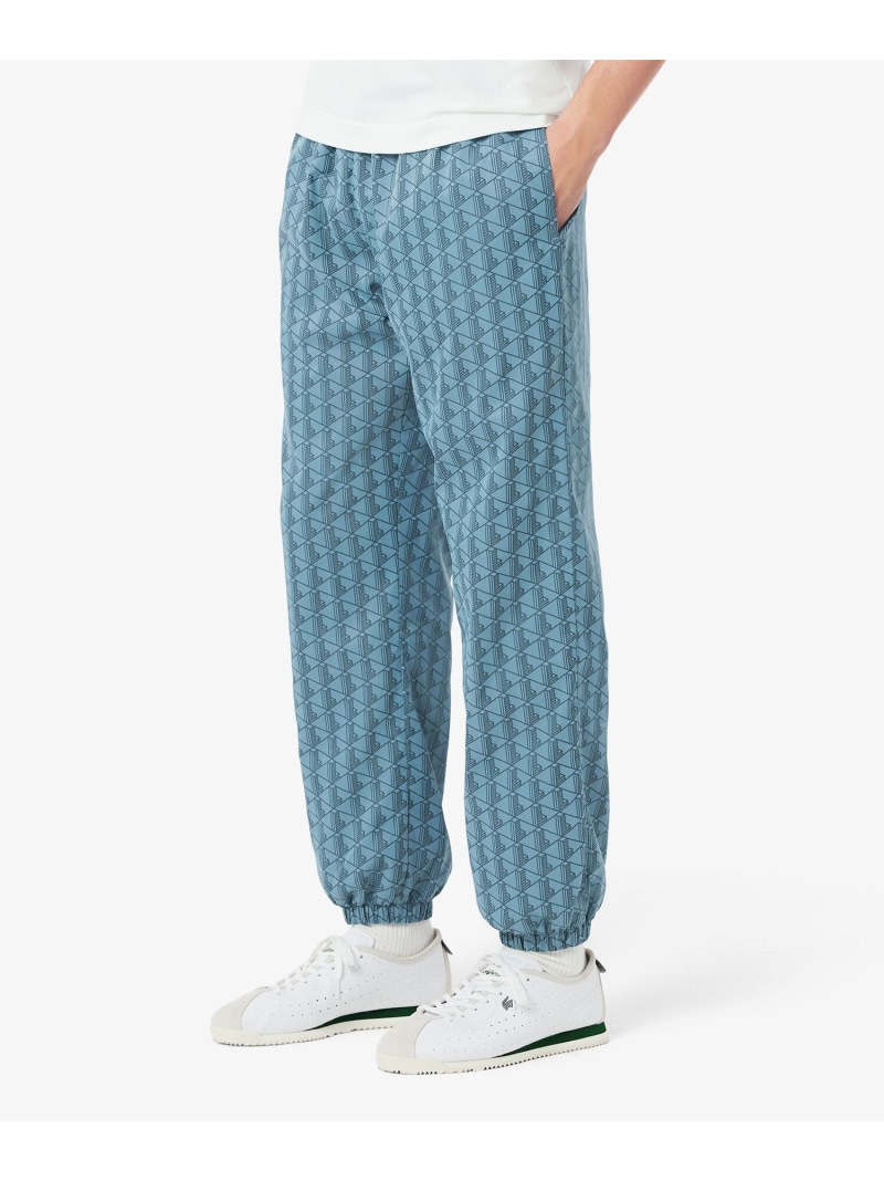 LACOSTE×NETFLIX総柄トラックパンツ ワニコラボロゴ新品 LA021EM13687_7_l.jpg