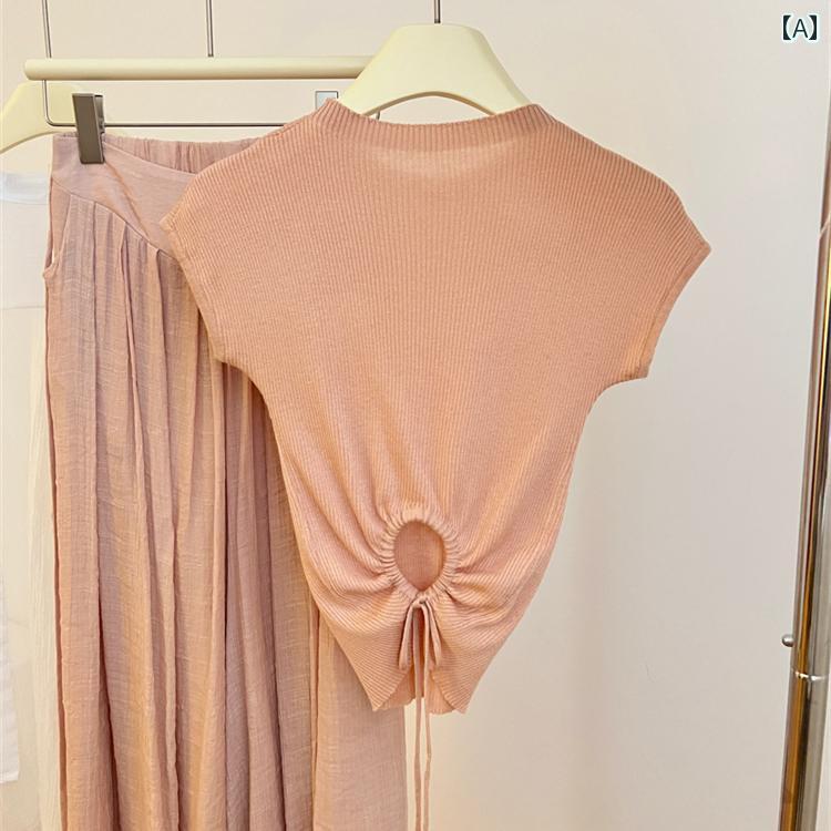 シンプル 半袖 ニット レディース 夏の レディース 半袖 ニット Tシャツ。 背中が くり抜かれたと スリム ウエストの トップ。