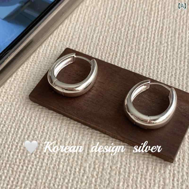 イヤリング 女性用 丸型 純銀 光沢加工 クールスタイル 個性派 シンプル モダン 日常使い シルバーアクセサリー