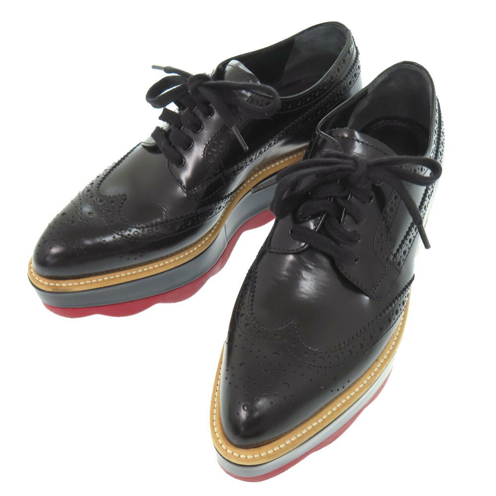 美品 プラダ プラットホーム 厚底 ウィングチップ 大きさ36 1/2 なめし革 天然ゴム 黒いこと なめし革シューズ 置き目毛革 黒 0299【中古】PRADA