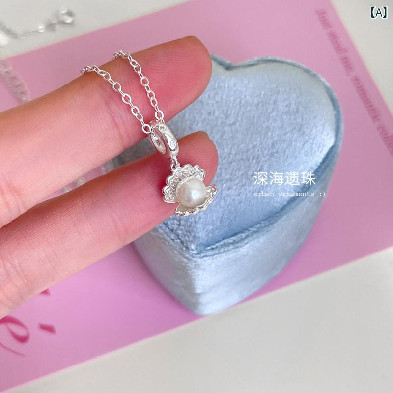 ネックレス 女性用 925シルバー 鎖骨チェーン 珍珠 貝殻 アクセサリー 夏 リゾート風 清新 甘美 スタイル 軽量 百搭 ジュエリー 自然モチーフ 銀製 細工 チェーン 調整可能 長さ 41-50cm ビーチ アクセント トップス 合わせ かわいい