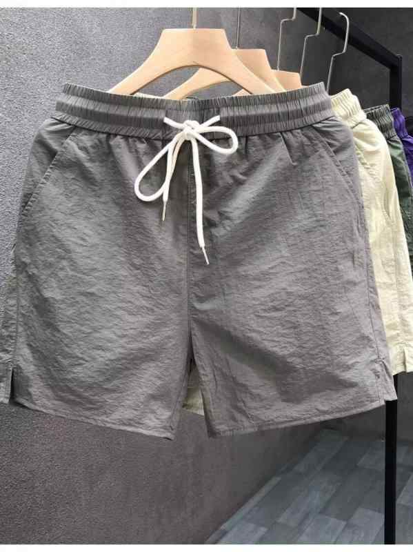 夏 メンズ ショーツ ファッション レジャー 百搭 速乾 ビーチパンツ ソリッドカラー シンプル トレンド スポーツ ユニセックス クォーターパンツ 直筒型 ポリエステル ブラック グレー グリーン ベージュ 吸湿速乾 軽量 通気性 カジュアルスタイル