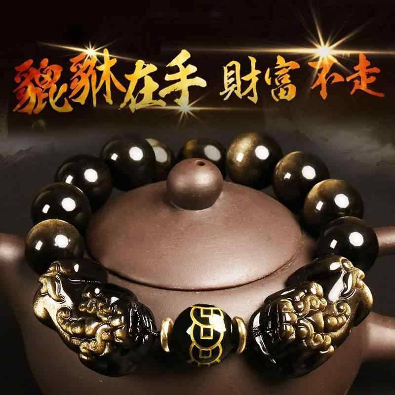 天然 金曜の 石の双 ピシュピストの ブレスレットの 男性の 手は 仏 珠の 女性の 金 耀石を 串に 刺します。