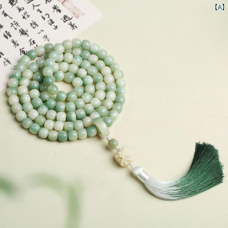 天然 白玉 菩提 根 手 串 108 個の 数珠 女は 指の 柔らかい 菩提 子の 皿を 巻いて ブレスレットの 男の 仏 珠 文を 遊んで 遊んで います。