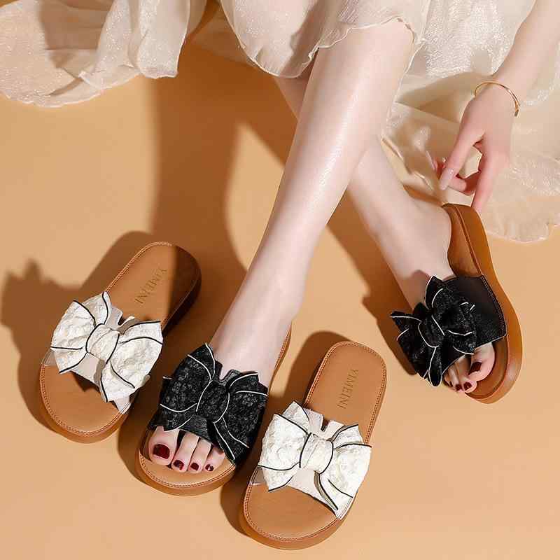 サンダル 女性用 夏用 真皮 バタフライボウ 厚底 ビーチシューズ ソフトソール フラットサンダル かわいい 甘めスタイル 牛革 牛筋底 日常使い ブラック ホワイト 純色 フラワーモチーフ キャンディカラー 軽量 快適 通勤 外出