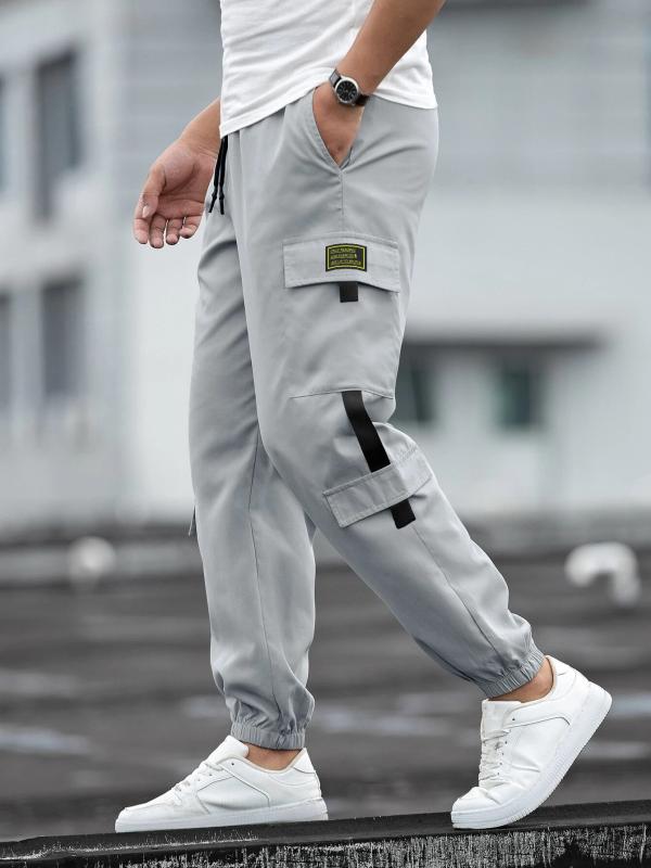 メンズ 工装パンツ 男性用 運動 休? 束口長ズボン 長パン ミッドライズ ウエストベルト 紐締め ミドルウェイト 無地 直筒 切り替え カラー ブラック ライトグレー ブルー カーキ 伸縮性 混紡素材 綿混 透気性 吸湿速乾 色牢度 免・聞処理 ゆったり