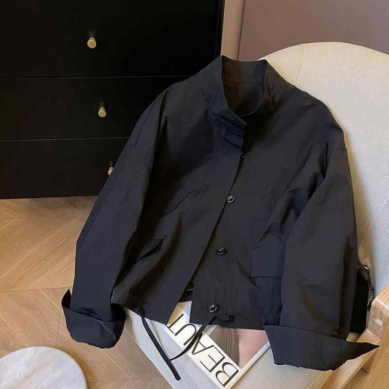 レディース 外套 春季 黒 立領 長袖 系帯 ドローストリング コンパクト 防水 ジャケット 気質 通勤 都市 カジュアル ナイロン 加工 軽量 吸湿速乾 切り替え デザイン 普段使い アウトドア 対応 ビッグシルエット スタイリッシュ トップス