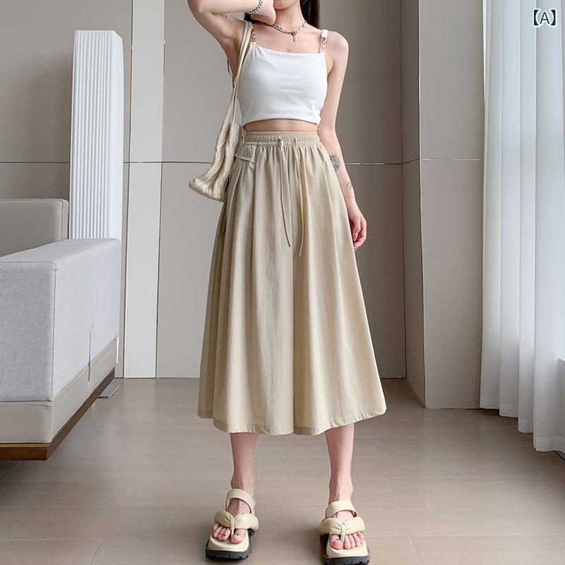 レディース スカートパンツ 夏 薄手 女性用 スリム Aライン ミディ丈 ドレープ 膝丈 ショートパンツ 接触冷感 ハイウエスト ワイドレッグ ニット ストレッチ ポケット ポリアミド 切り替え カジュアル ライトブラウン カラー ピンク ブラック かわ