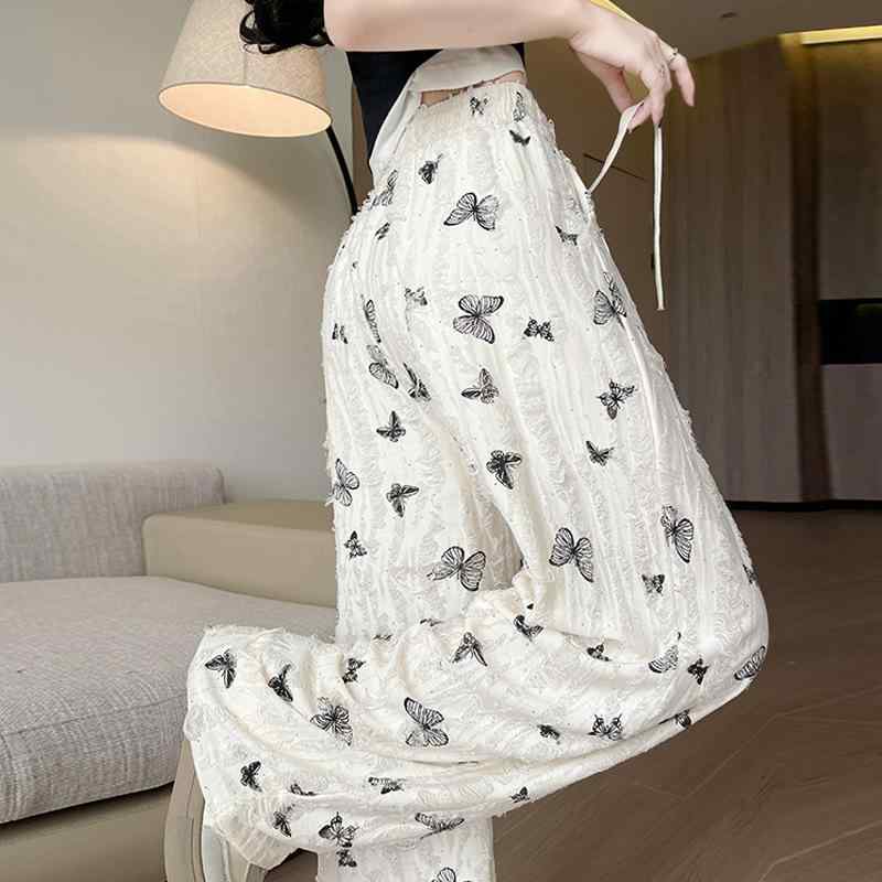 レディース 夏用 接触冷感 ワイドパンツ 女性 高腰 ゆったり 垂感 ストレート ロング 丈 ビッグシルエット 薄手 高弾性 ポリエステル 混紡 レイヨン 混合 破れデザイン フラワー柄 プリント 杏色 ブラック 日韓カジュアル スタイル ルーズフィット