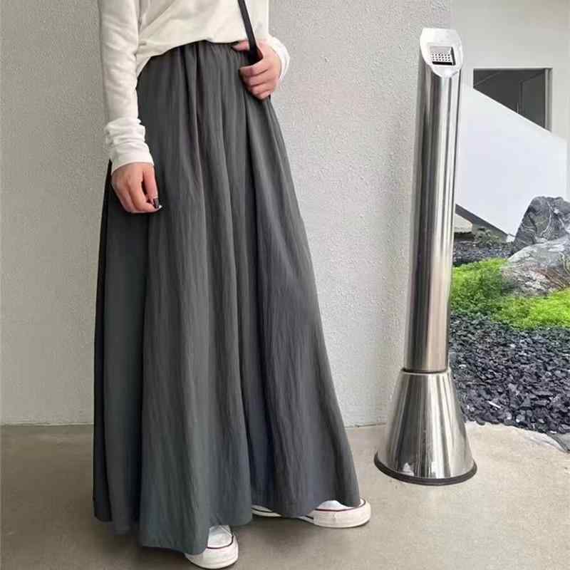 秋冬 スカート 女性用 韓系 シンプル ファッション 休日スタイル ロング 傘型 半身 垂れ感 脚長効果 アイスクリームカラー イエロー ホワイト ベージュ ブラック ルージュ カーキ ブラウン グレー パープル ポリエステル ストレッチ プレーツ加工