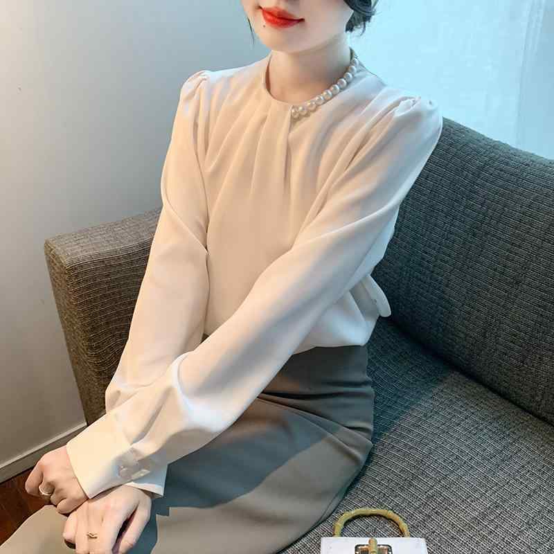 シャツ 女性用 秋季 長袖 丸首 半開き襟 直筒シルエット 切り替えデザイン 釘珠装飾 光沢サテン 生地 アクネロン 素材 純色 杏色 ピンク系 通勤 普段使い 都市 カジュアル トップス 気質 スタイル 軽量 伸縮性 吸湿速乾