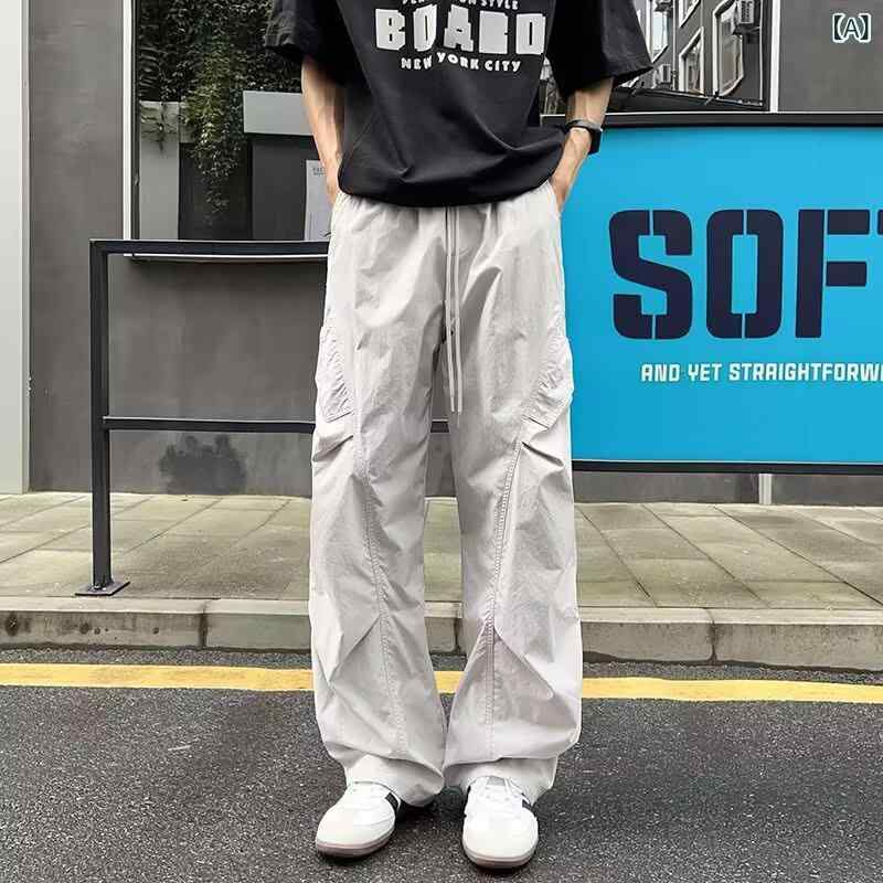 メンズ 工装パンツ 黒 ワイドレッグ ドローストリング 速乾 コットン混紡 軽量 薄手 微弾性 垂感 直筒型 切り替え 多ポケット 夏用 透気 吸湿排汗 耐摩耗 抗菌 色牢度高 ミッドライズ 系縄閉襟 純色 長ズボン 青少年 休? ストレートヘム