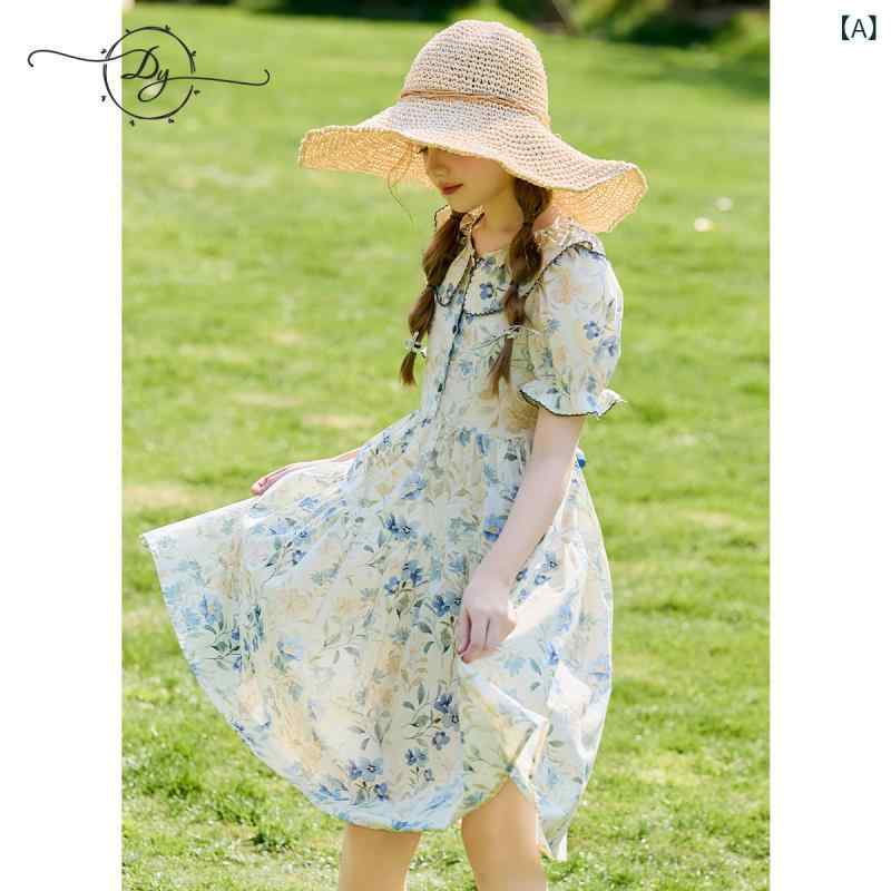 女の子の ワンピースの 大きい 子供の フランスの 花の 泡の 袖は 腰の スカートの 2025 夏の 新型の 高い 腰は やせて いる 王女の スカートを 現します。