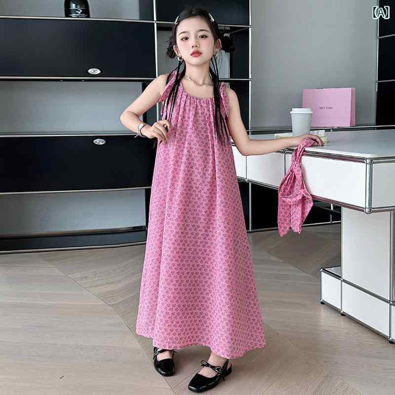 女の子の 韓国 系の ワンピースの 夏の 2025 新型の 女の子の 大きい 子供の 甘い 花の ベストの スカートの 子供の 薄い 金の ロング スカート