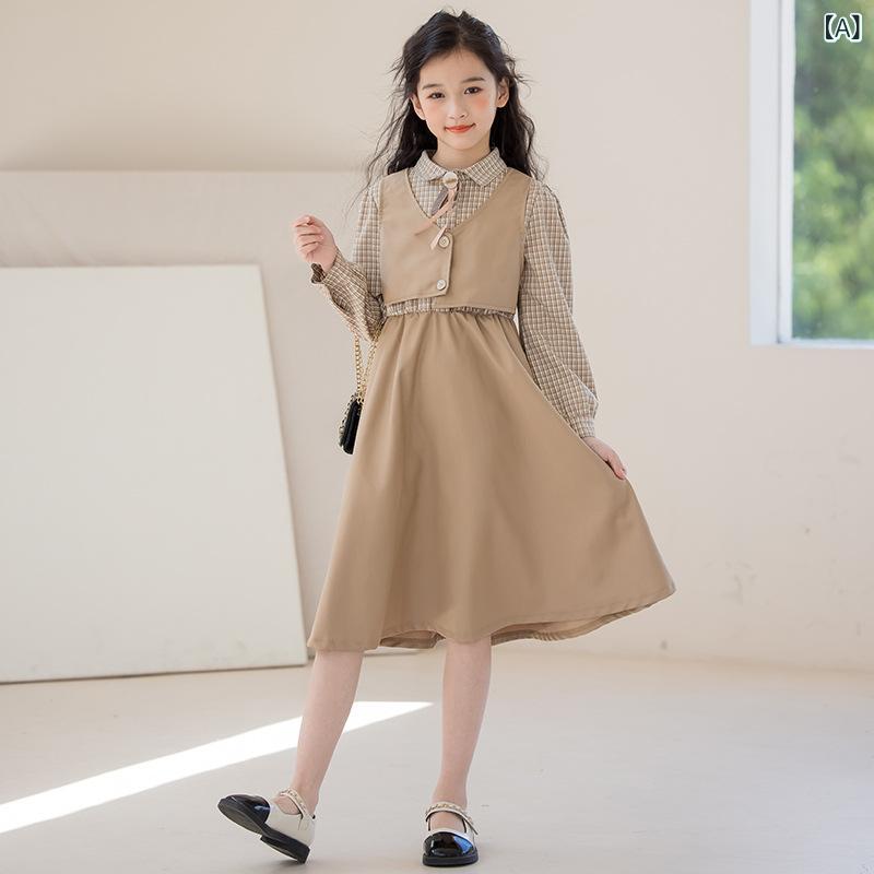 女の子の 偽の 2つの ワンピース 2023 新型の 秋の 学院の 風の ワンピースの 女性の 大きい 子供は 膝の 洋の 空気を 越えて 色に ぶつかります。