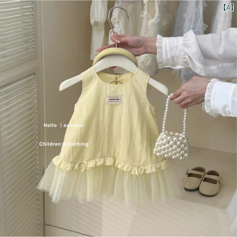 女の子の ワンピース 2025 夏の 新型 子供の ネットの 糸は ベストの スカートの 女の子の 薄い タイプの 綿布の 王女の スカートを つなぎ 合わせます。